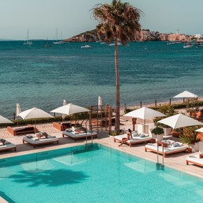 View of the pool and surrounding day beds 